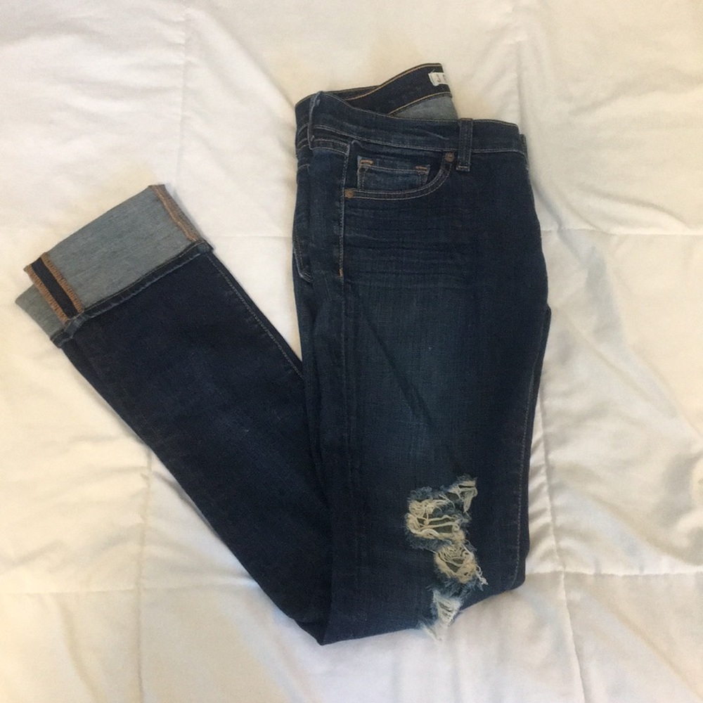 Destroyed medium/dark wash skinny jeans
